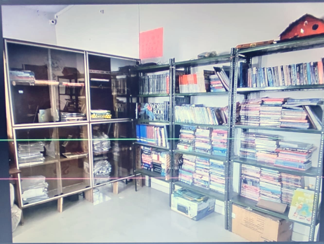 Shelves of books and periodicals in the college library